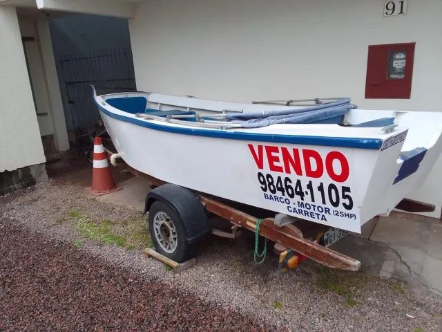 Selling boat with 25 HP engine and trailer, all legally registered.