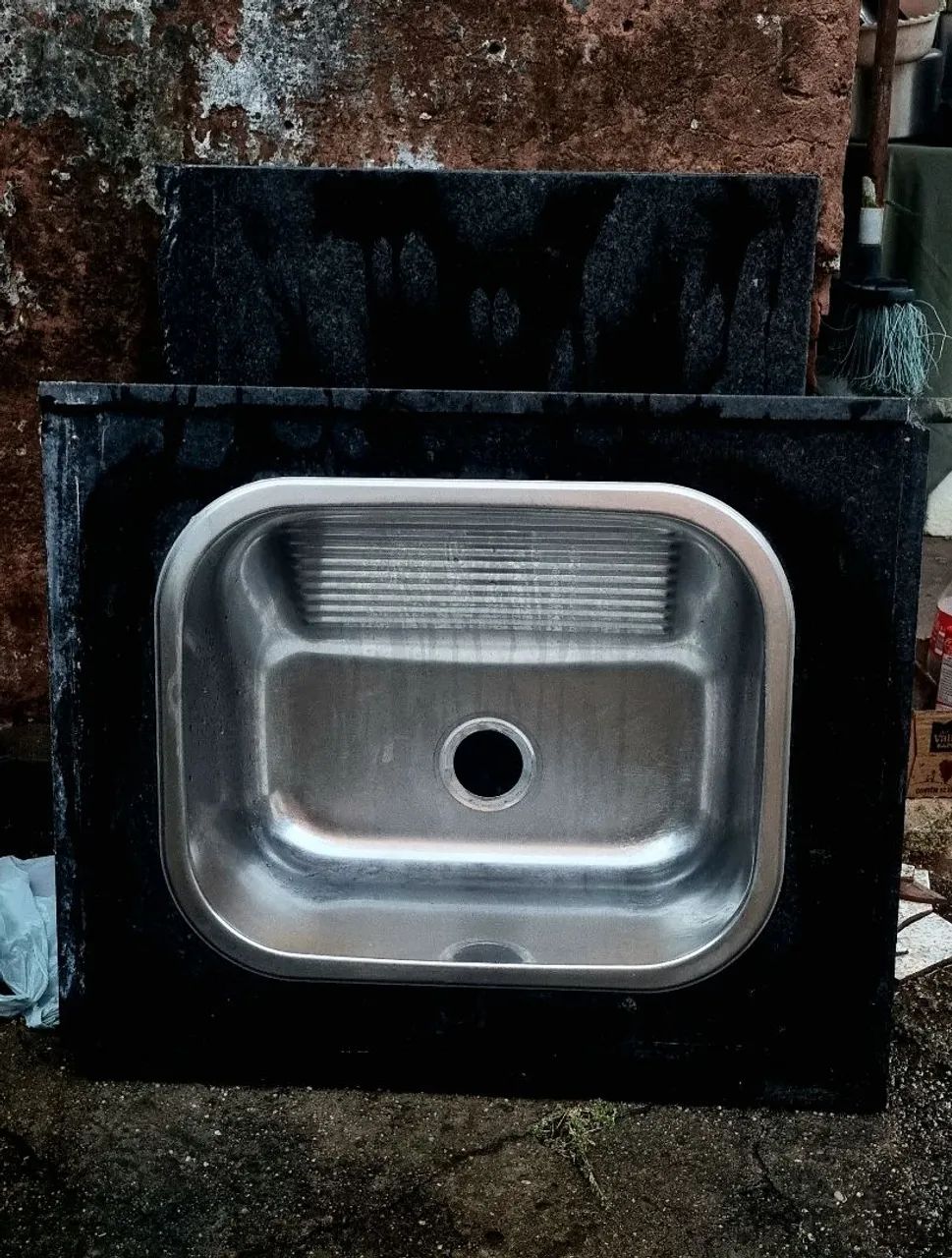 Lavatório de mármore com tanque inox tramontina impecável. 