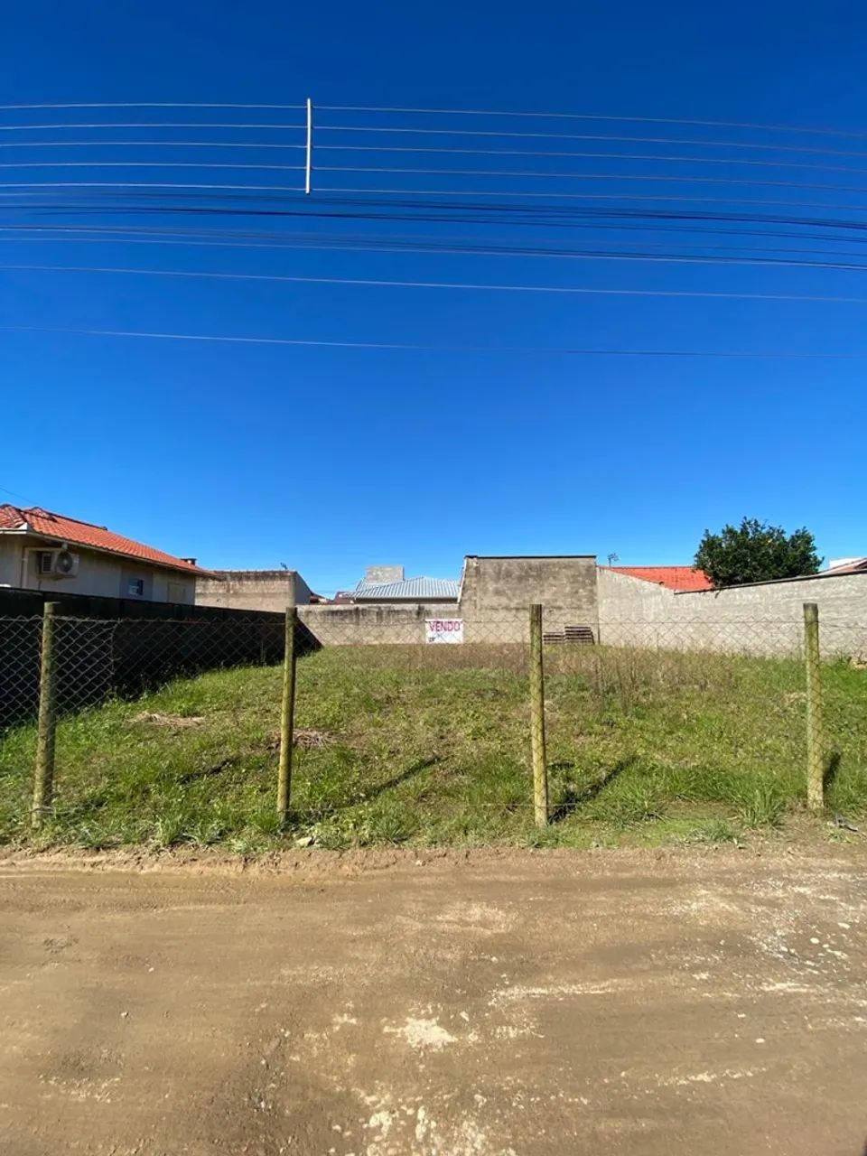Vendo terreno aterrado e murado 