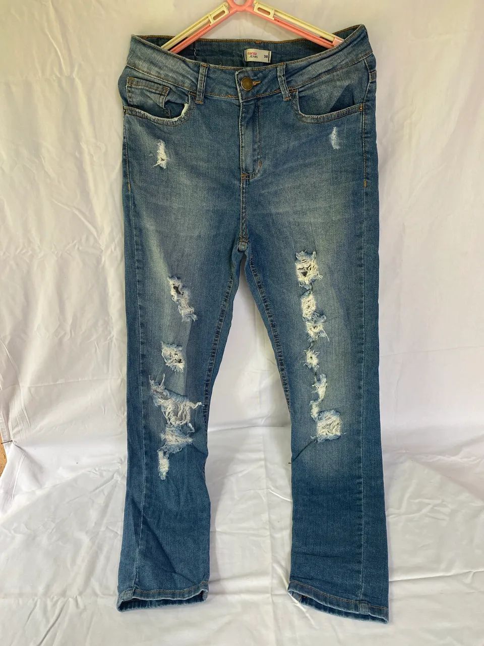 Calça jeans rasgada 38