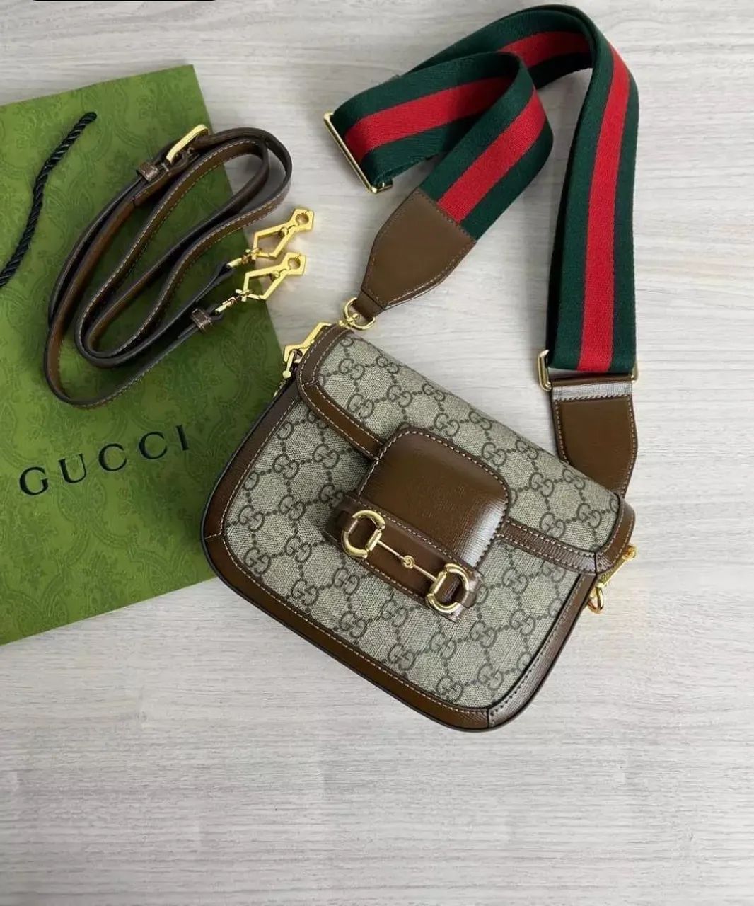 Gucci em canvas e couro legítimo 