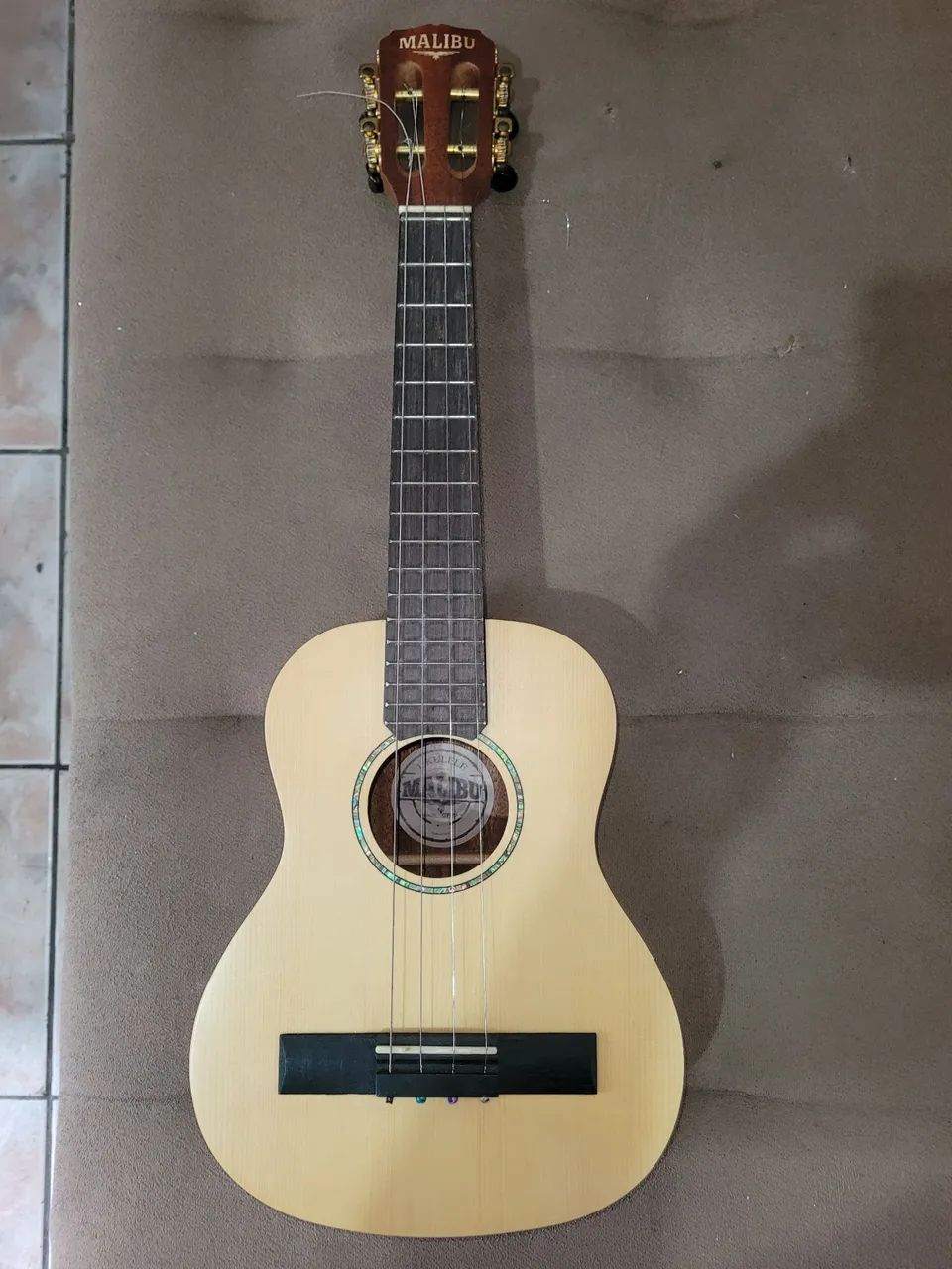 Estou vendo cavaquinho com capa
