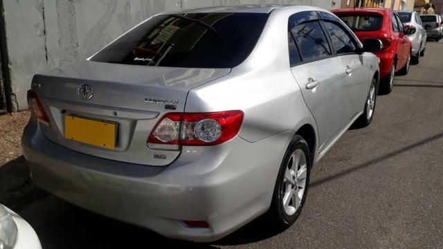 Corra Corolla Xei 2013 41.900 uauu 10 mil abaixo da fip - Foto 5