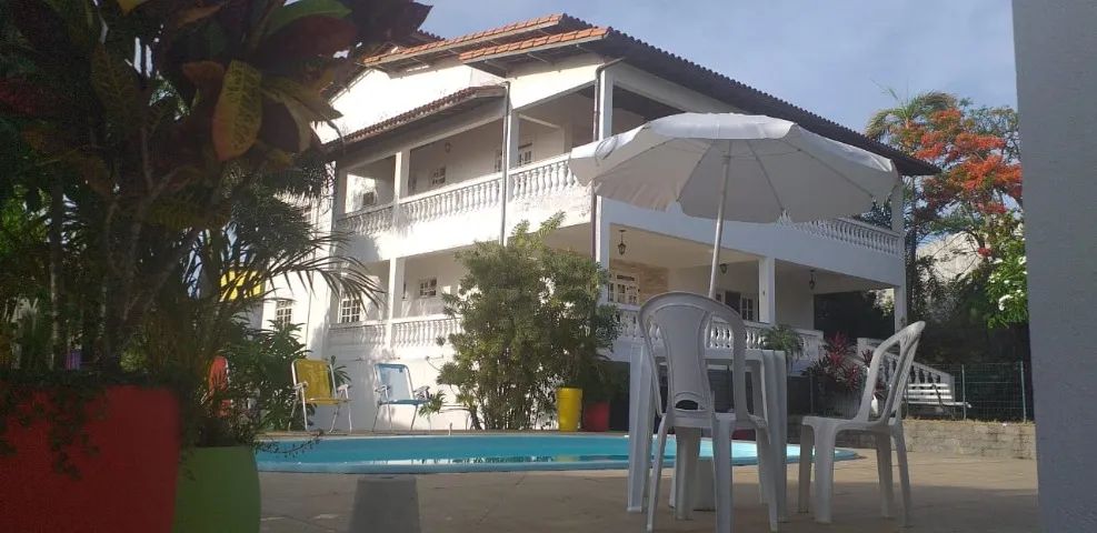 7/4 6 suites  5 c/ar  wi-fi 900m praia piscina churrasqueira  área verde 7 vagas  garagem 