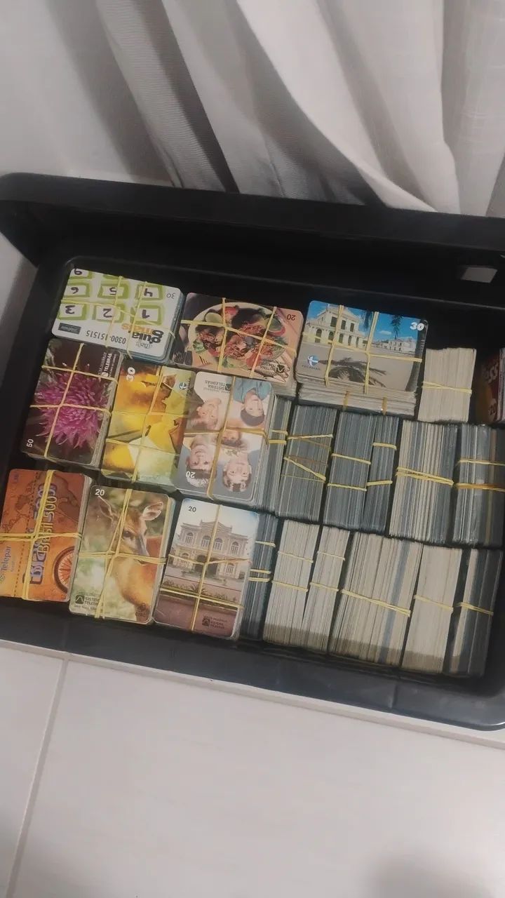 Lote 700 cartões telefônicos