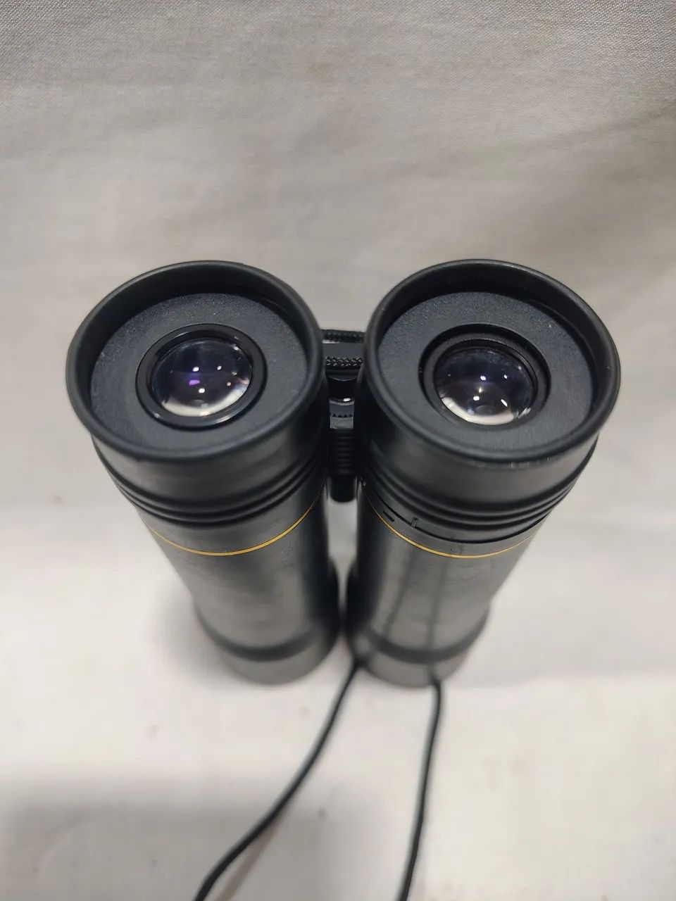 Binóculos Tasco 10x25 Usado  - Foto 4