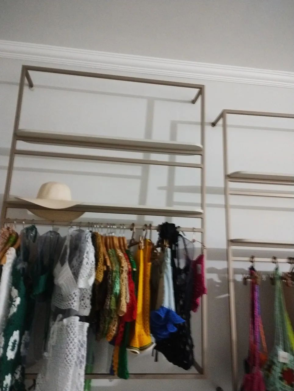 Expositores de parede para roupas