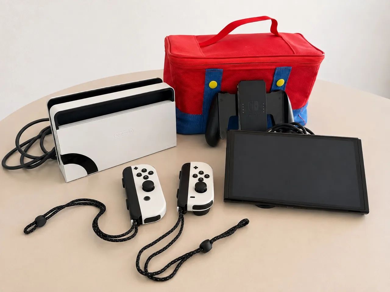 Nintendo Switch OLED Completo + 2 Jogos + Bolsa e Acessórios - Foto 2