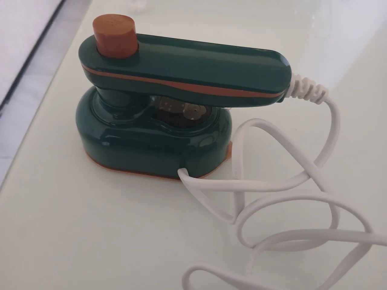 Mini ferro de passar roupa
