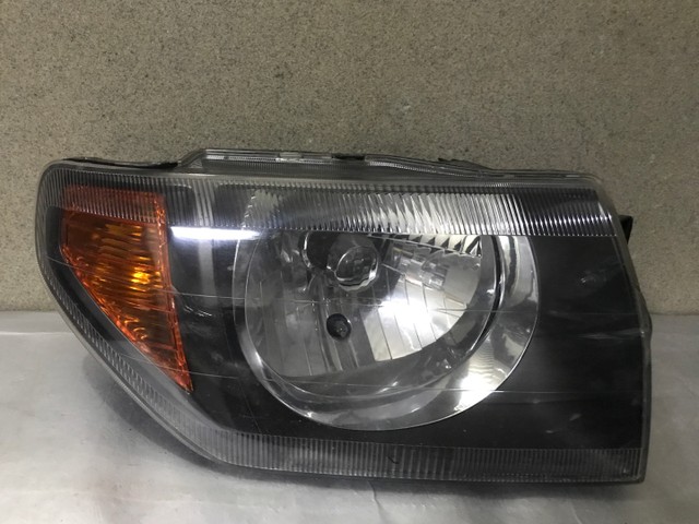 Farol Mitsubishi Pajero Tr4(máscara negra )