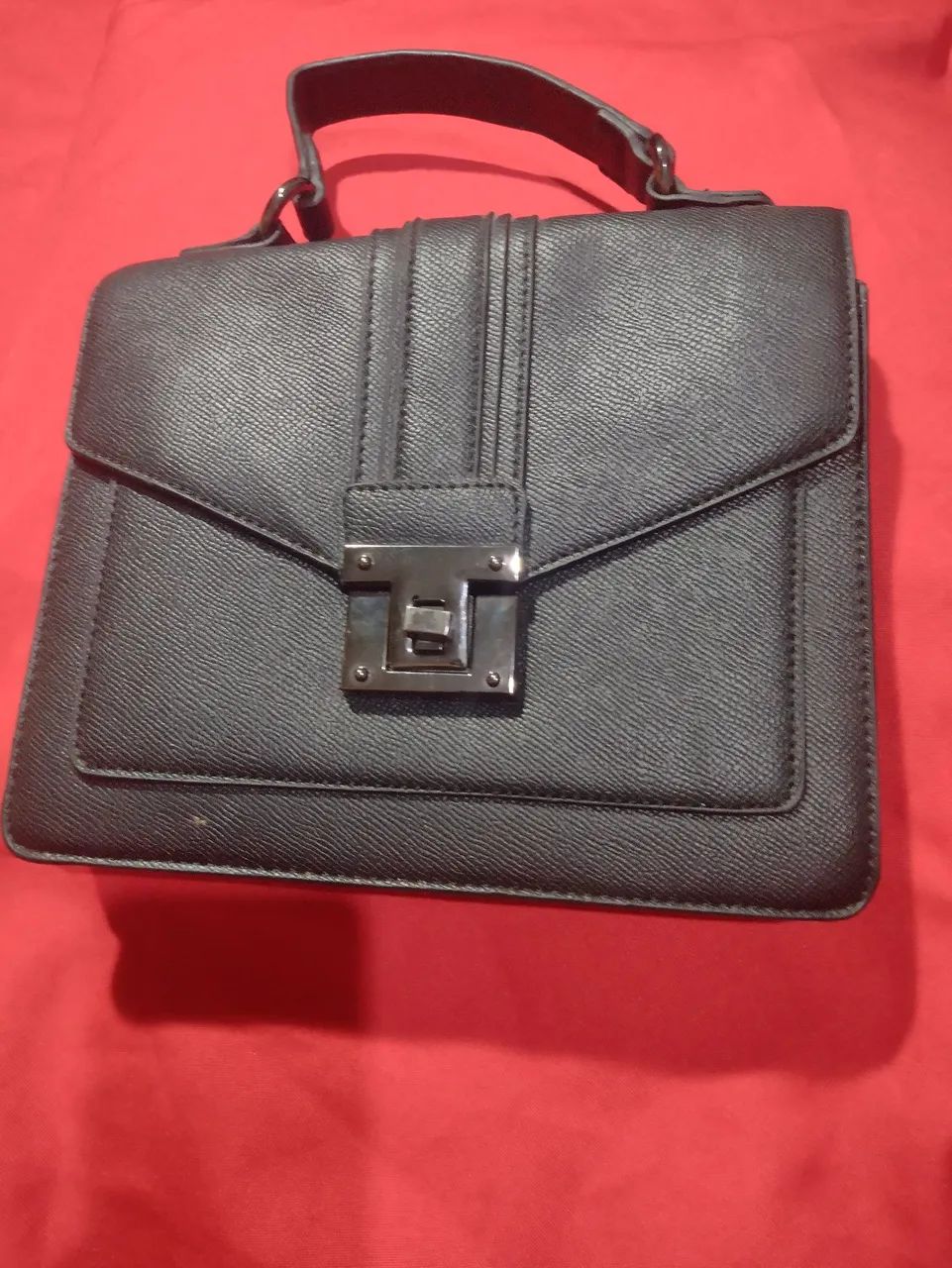 Bolsa de mão preta da marca Sonho dos pés 