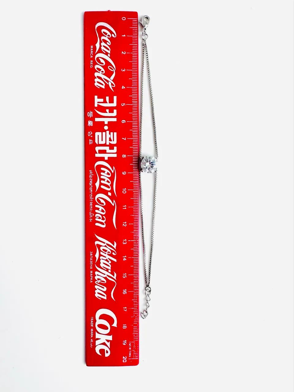Pulseira prateada com pedra brilhante  - Foto 4