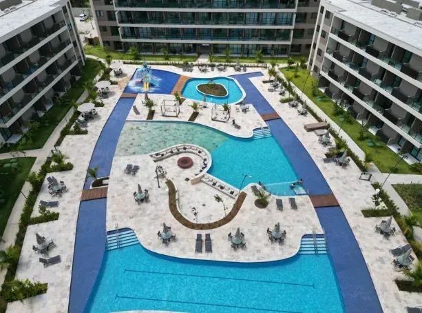 Apartamento na Praia de Muro Alto com 2 quartos e varanda voltada para piscina!