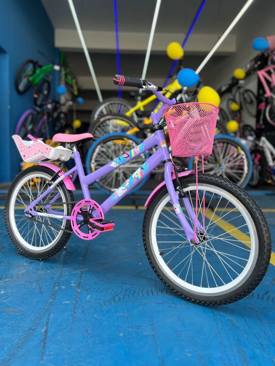 Bicicleta aro 20 seminova com cadeirinha de boneca - Lilás com rosa