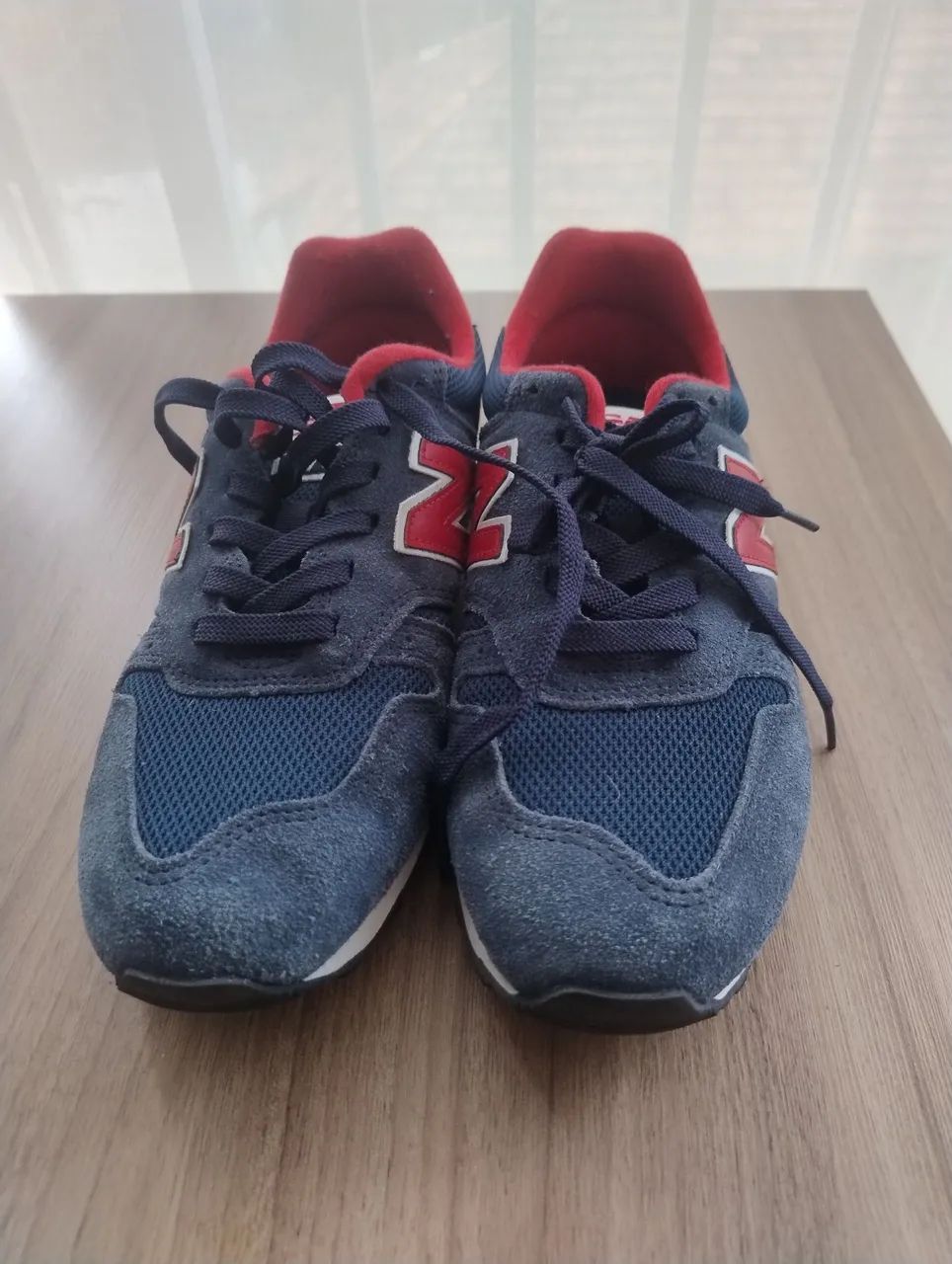 New Balance 373 em azul-marinho