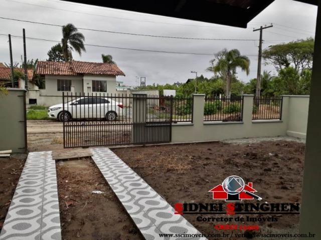 Casa novinha na Praia! Terreno todo murado, amplo espaço nos fundos - Foto 14