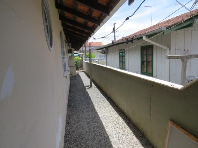 Excelente casa no Balneário Enseada com 3 quartos com ar condicionado - Foto 19