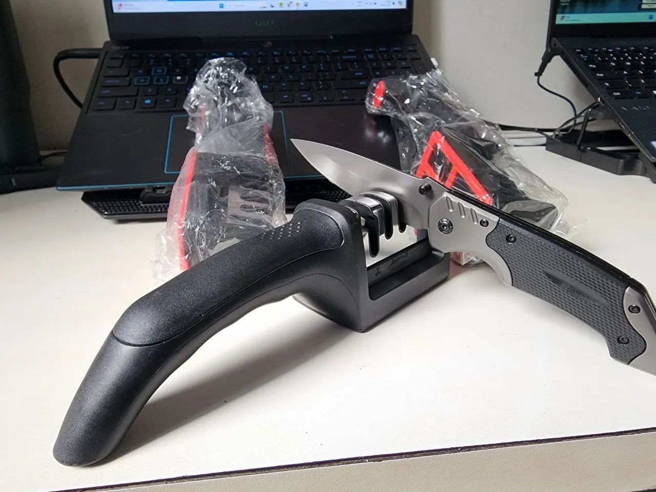 Amolador de Facas e Tessouras. 