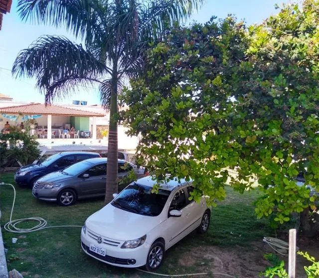 7/4 6 suites  5 c/ar  wi-fi 900m praia piscina churrasqueira  área verde 7 vagas  garagem  - Foto 4