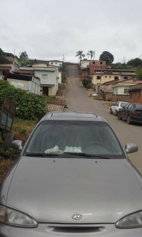 Vendo ou troco carro possui 800 reais de doc - Foto 3