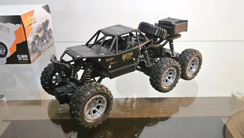 Carrinho de Controle Remoto a Bateria Recarregável 3 Eixos Tipo Jeep 4x4 - Foto 4