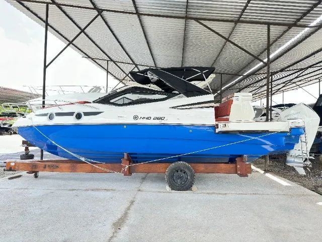 Lancha NHD 280 (275 nomenclatura Internacional) Cabinada Zero com motor Popa - Foto 12