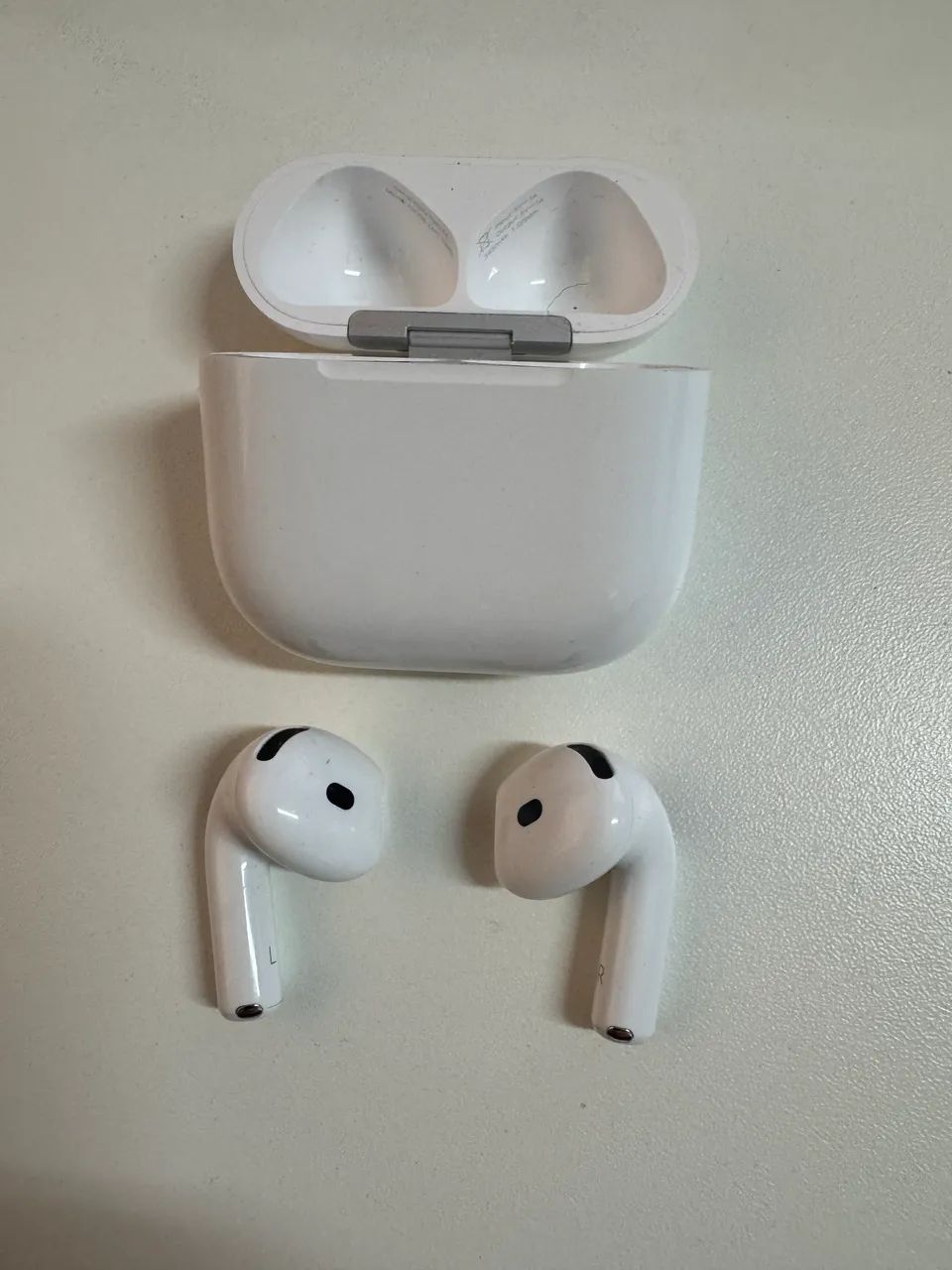 AirPod 4 com um mês de uso. 