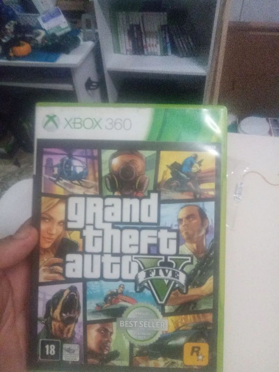 Jogo de Xbox 360 GTA 5 com o mapa e manual 