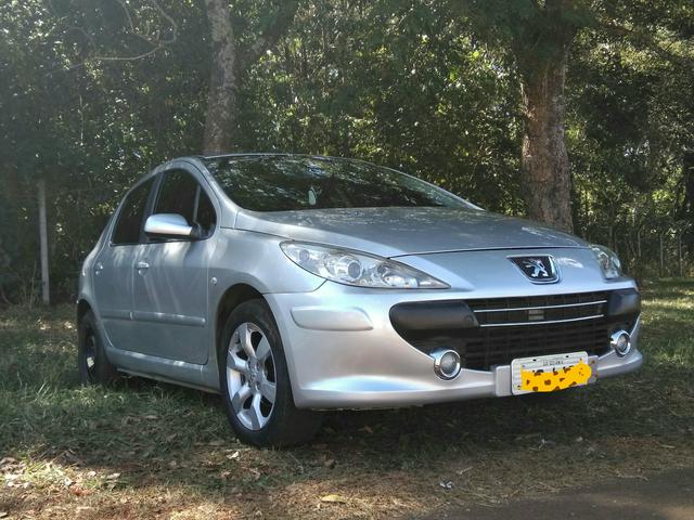 Troco ou vendo Pegeout 307 Presence Hatch - Foto 2
