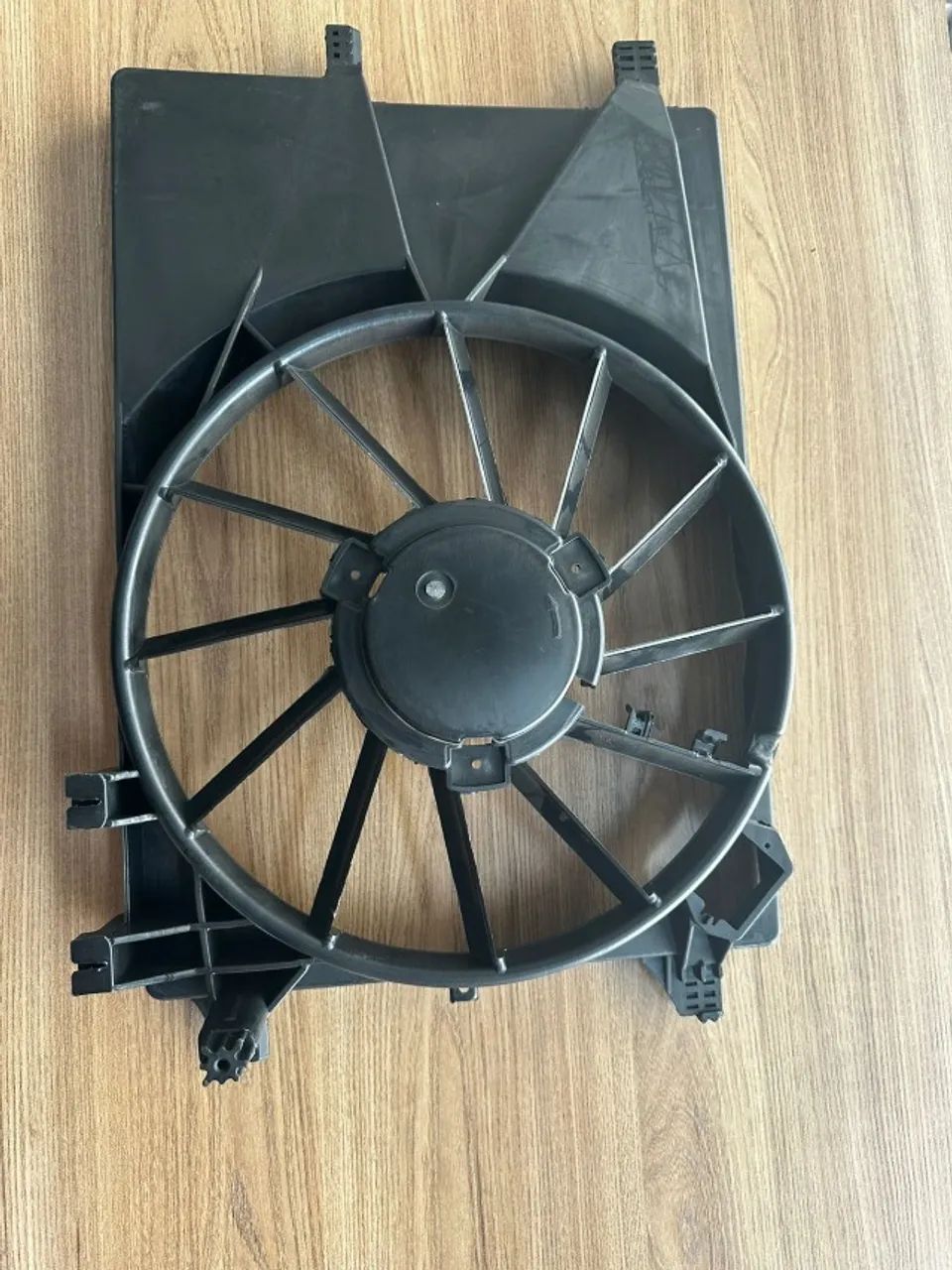 Defletor Ventoinha Agile Montana Nova Com Ar Condicionado 