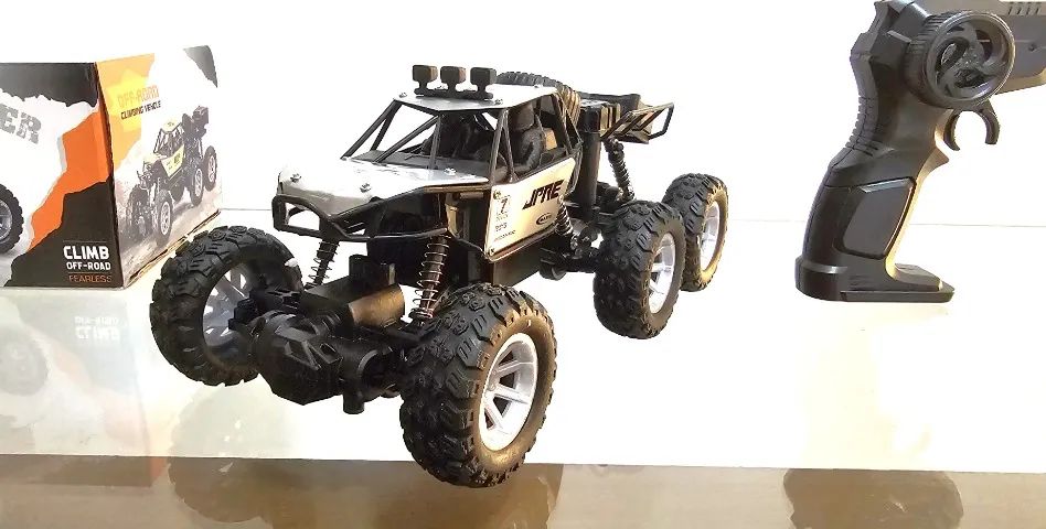 Carrinho de Controle Remoto a Bateria Recarregável 3 Eixos Tipo Jeep 4x4 - Foto 2