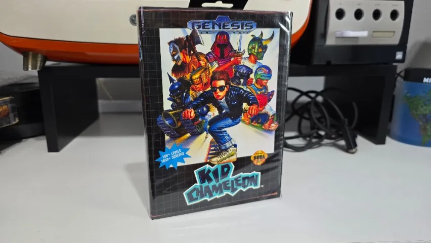 Jogo Kid Chameleon Mega Drive/Genesis paralelo com caixa e encarte