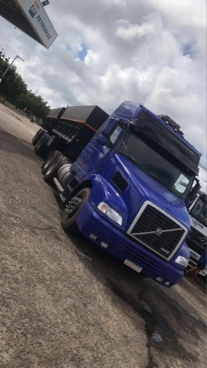 Caminhão Volvo NH 380 + bi caçamba randon 2011