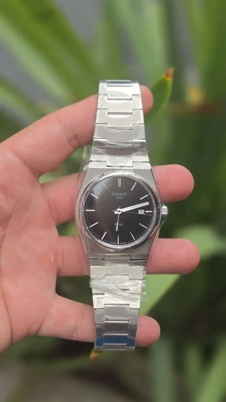 Tissot PRX preto com pulseira de aço 