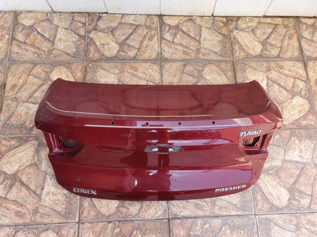 Tampa traseira Onix Plus 20/21 Original - Foto 4