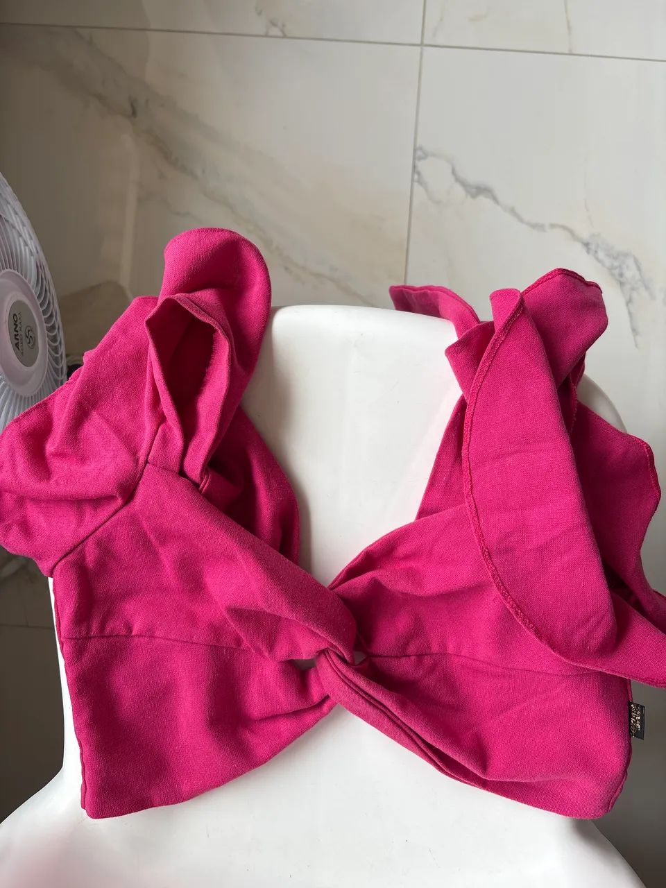 Roupa de amarração com laço rosa
