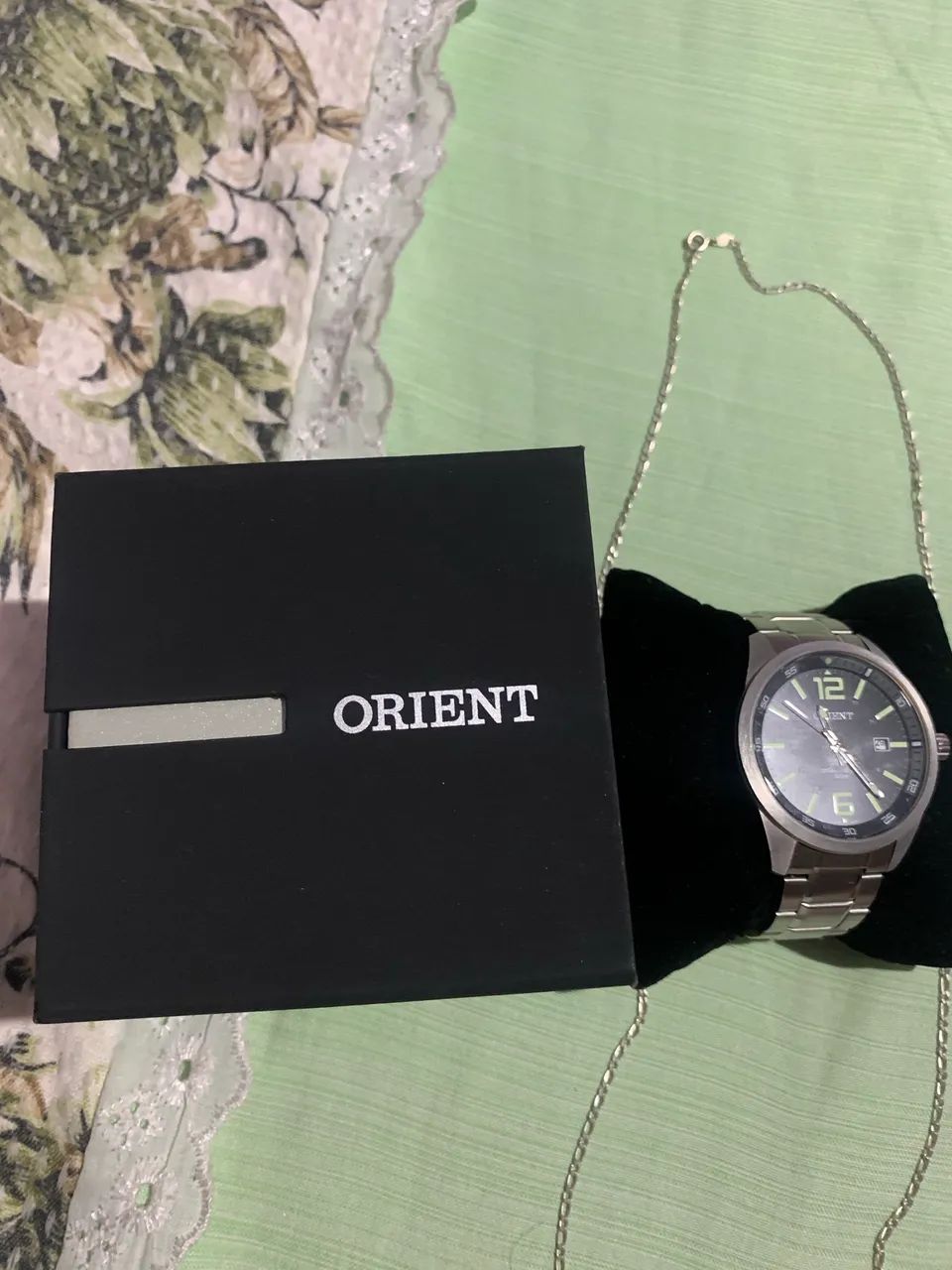 Relógio e cordão de prata 