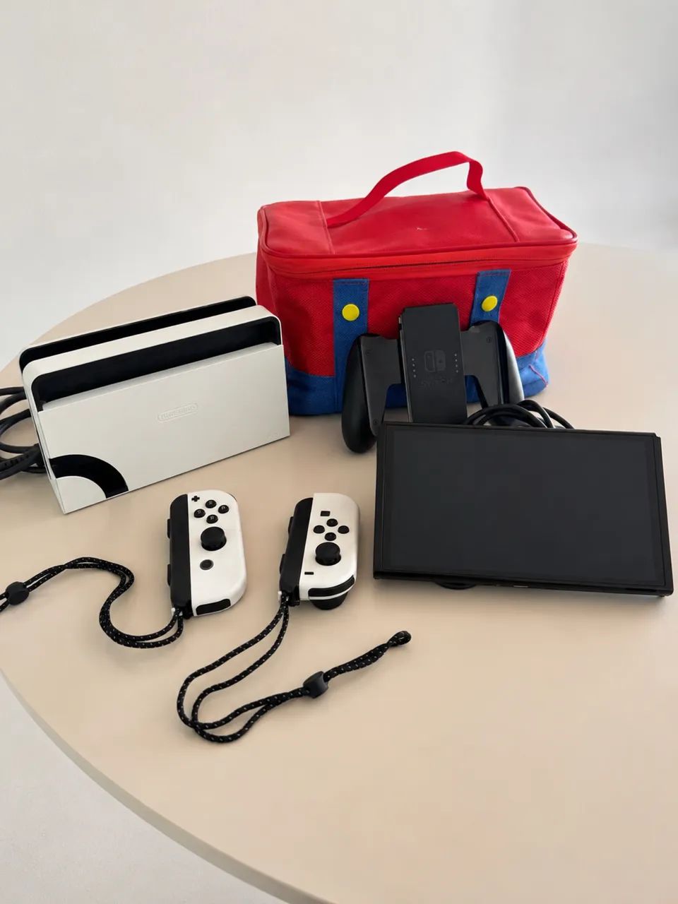 Nintendo Switch OLED Completo + 2 Jogos + Bolsa e Acessórios - Foto 3