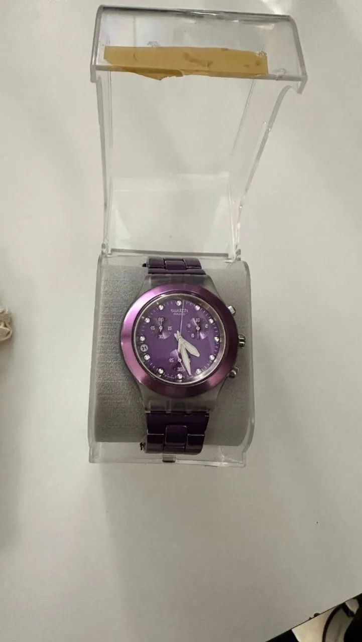 Relógio swatch feminino cara roxa 