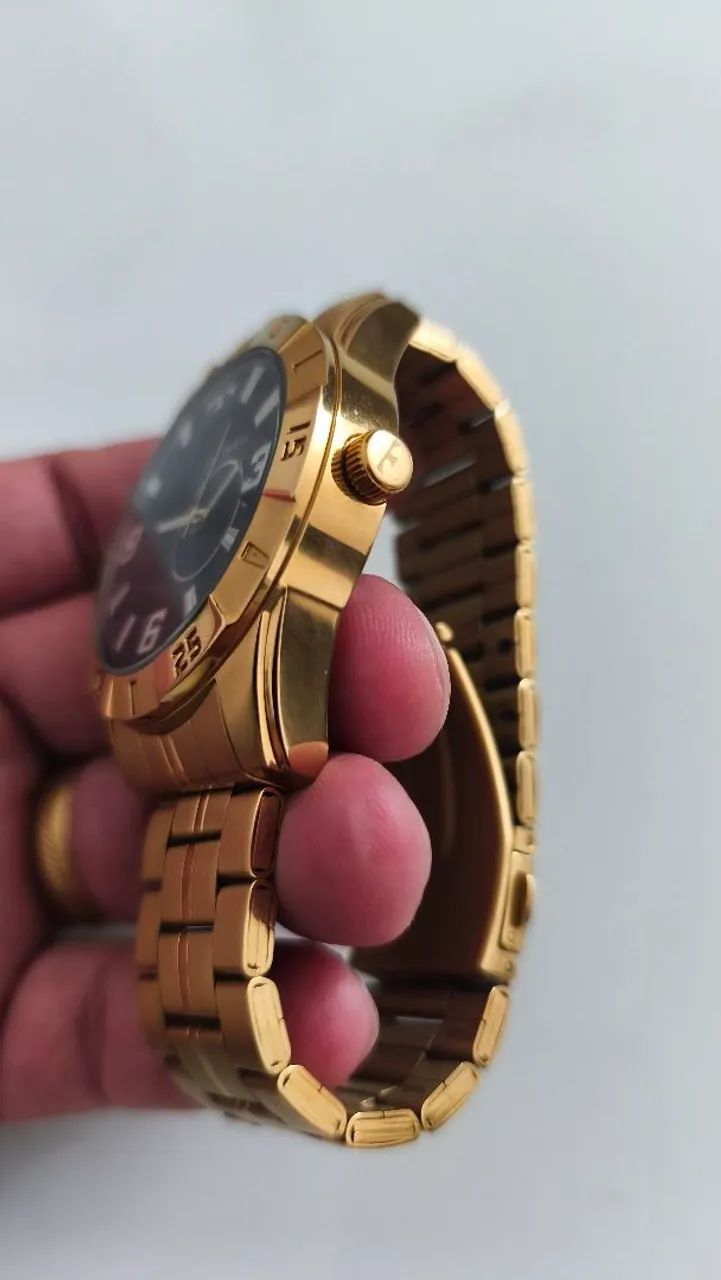 Relógio technos Racer dourado 