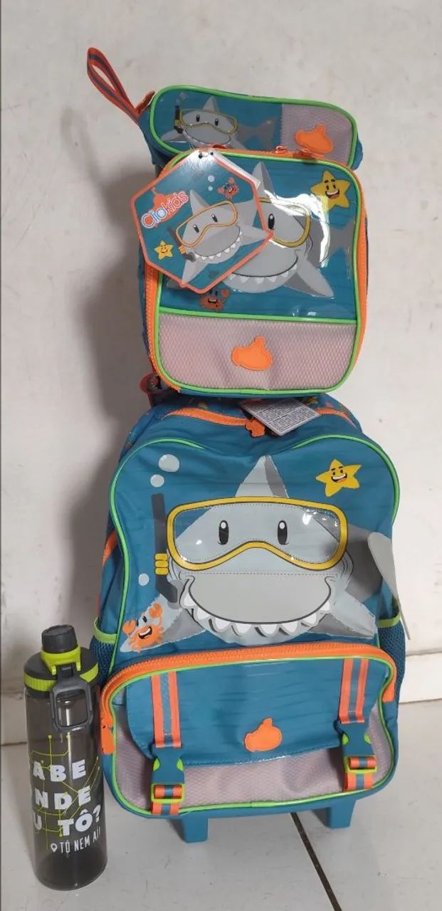 Kit mochila de carrinho semi nova , acompanha garrafa (nunca usada)