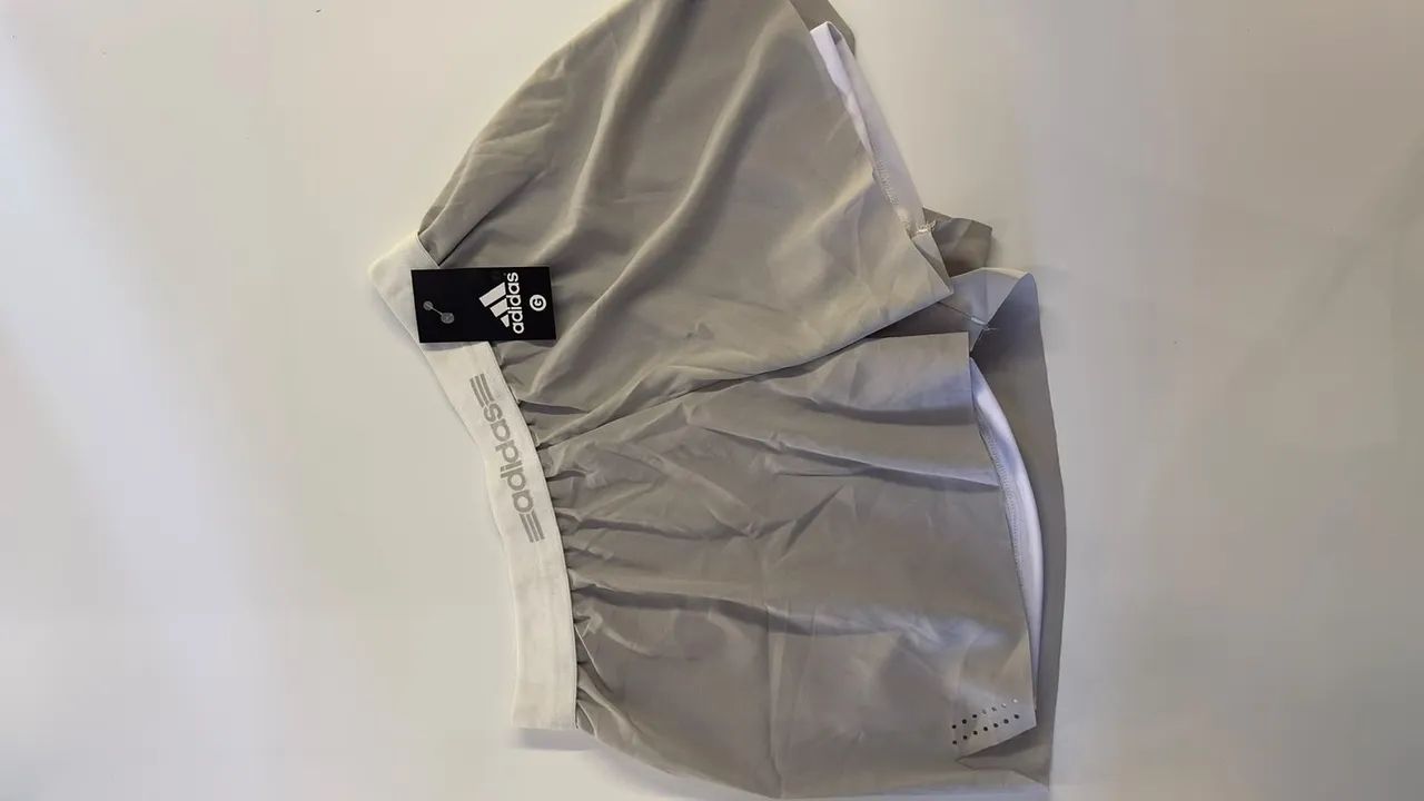 Short duplo para corrida cinza 