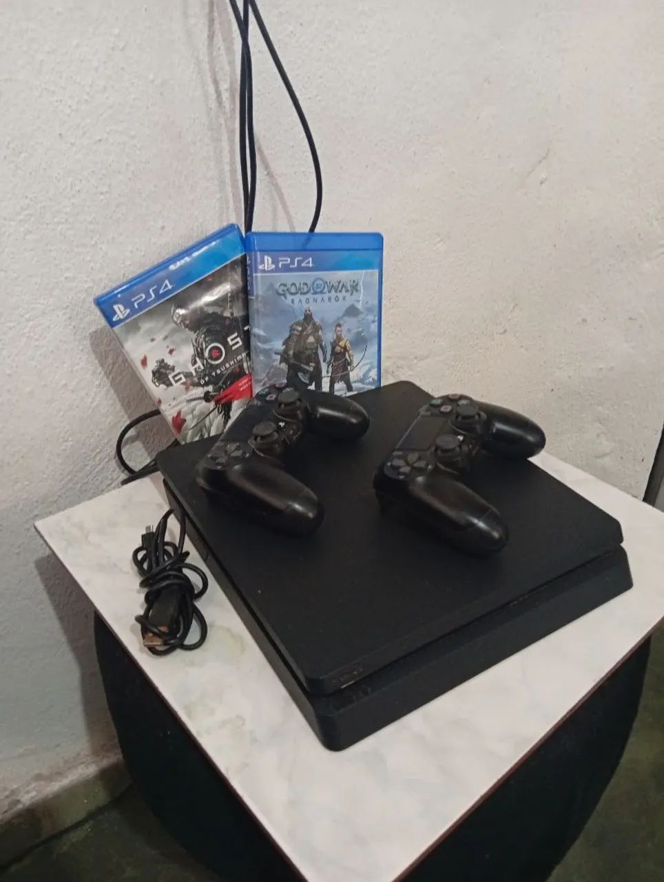 Ps4 slim com 1tb e leva 2 jogos