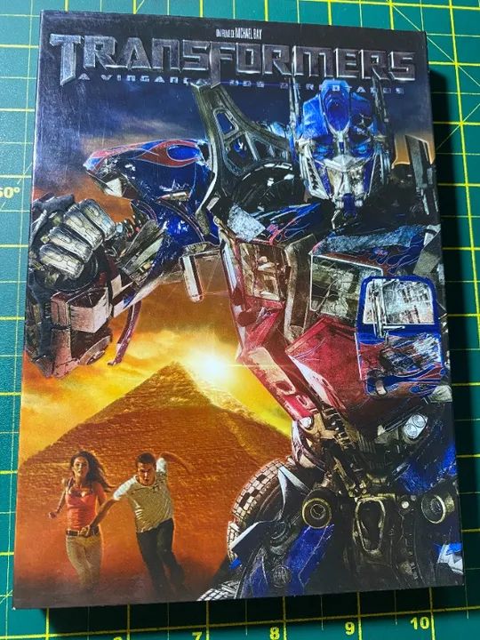 DVD com luva Transformers A Vingança dos Derrotados