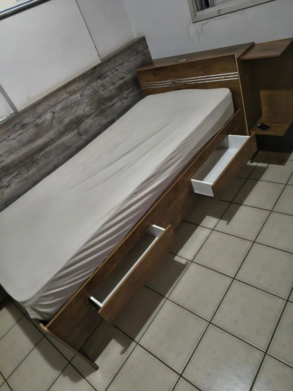 $500 SINGLE BED WITH STORAGE COMPARTMENT AND DRAWERS, AND SINGLE MATTRESS
