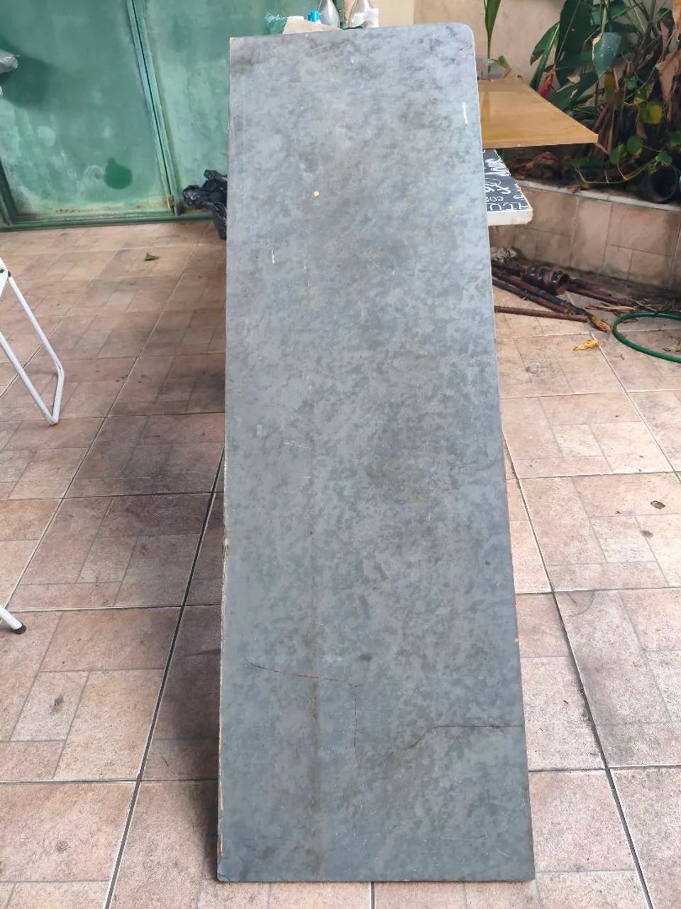 Vendo uma bancada de Ardósia,. com medidas de  1.55 de comprimento por 49 Cm de largura 