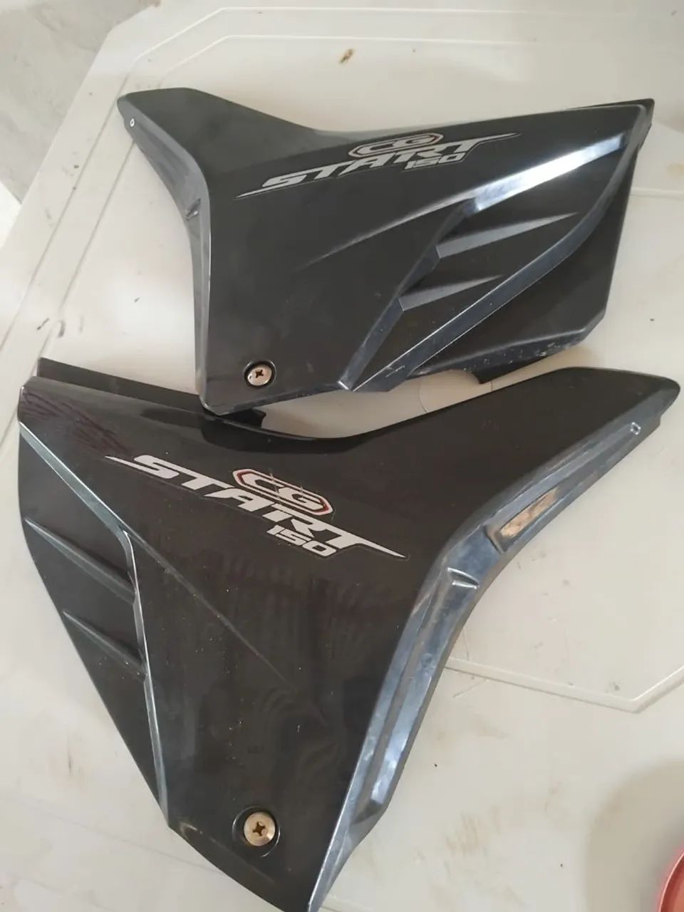 Vendo tampa lateral da 150