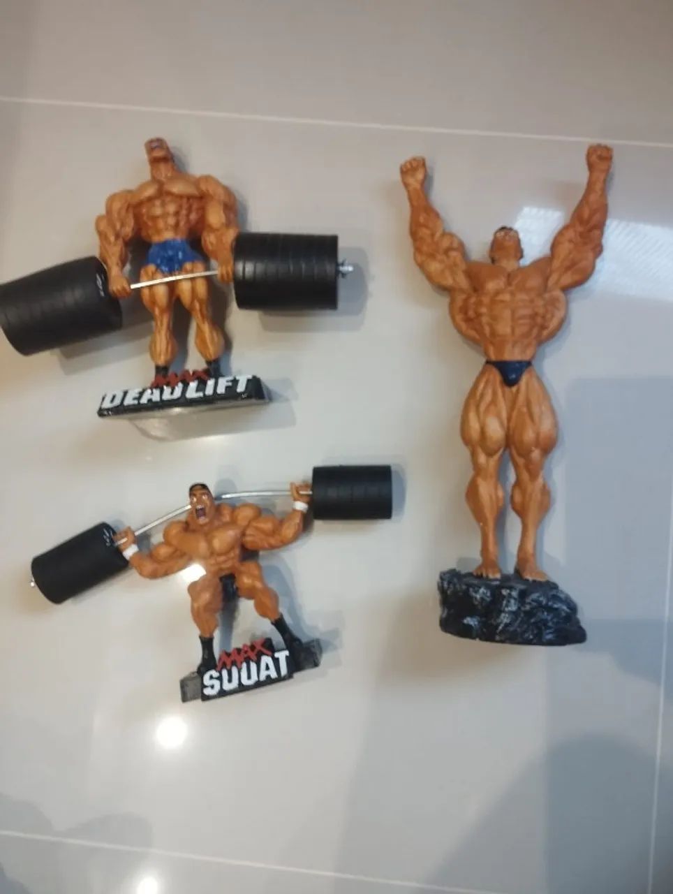 Trio boneco maromba de resina