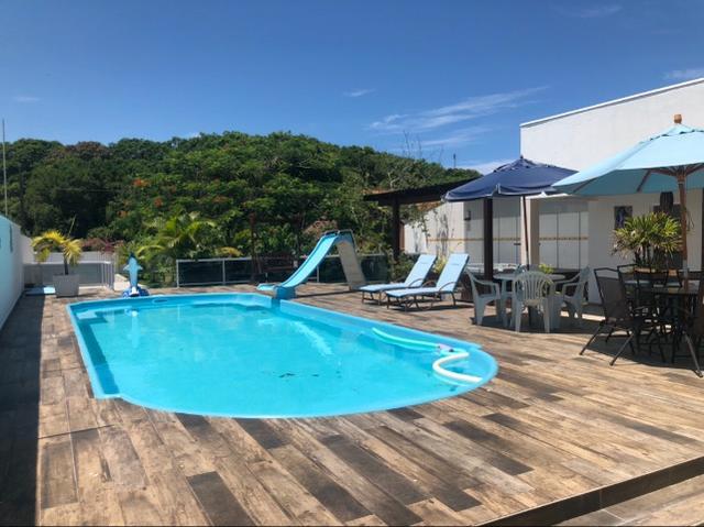 Aluga-se linda casa de praia com piscina en Itapoa ; barra do saí por temporada