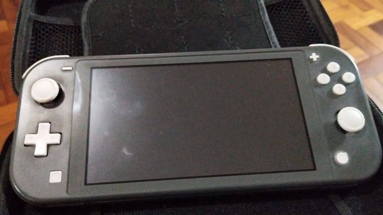 Switch lite Desbloqueado + cartão sd 128gb - Foto 2